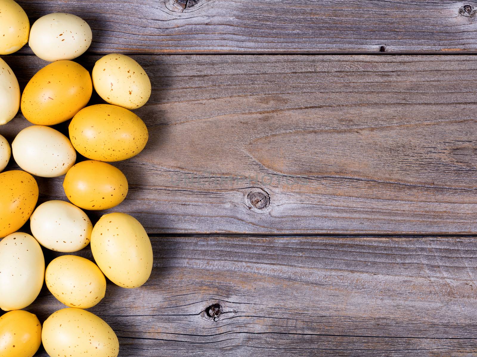 Eggs on rustic wooden boards  by tab1962