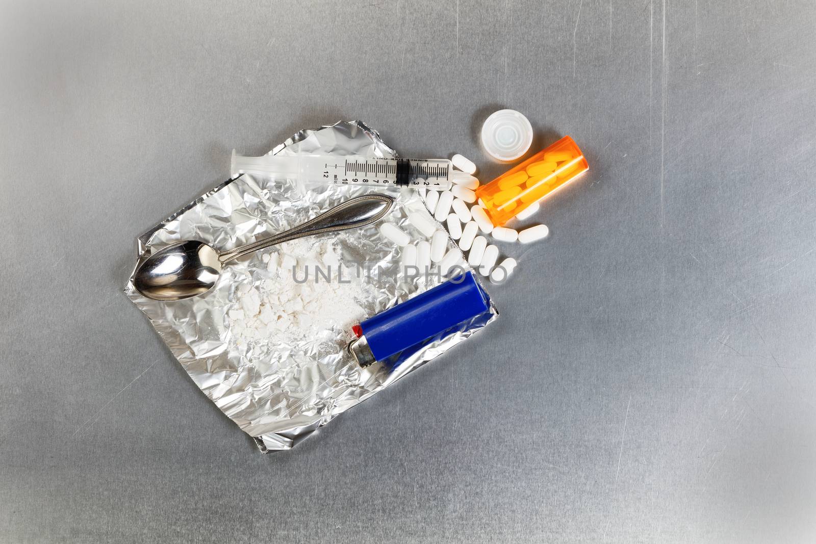Crushed painkiller pills and other objects being prepared for dr by tab1962