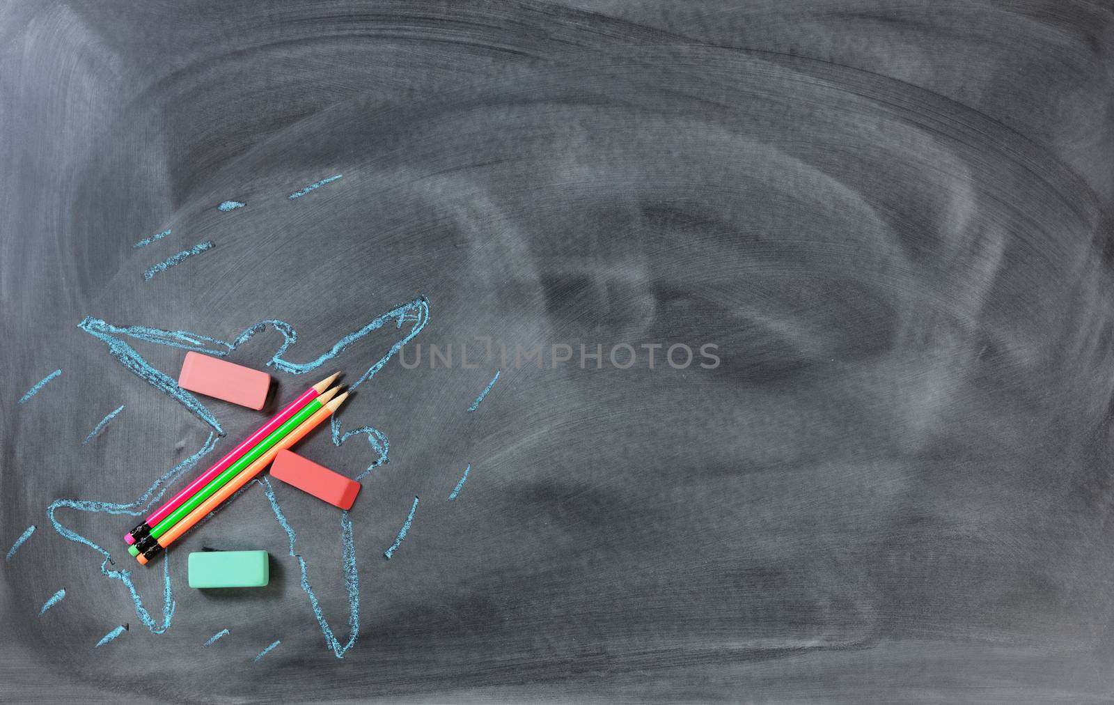 Back to school chalkboard with airplane consisting of pencils and erasers 