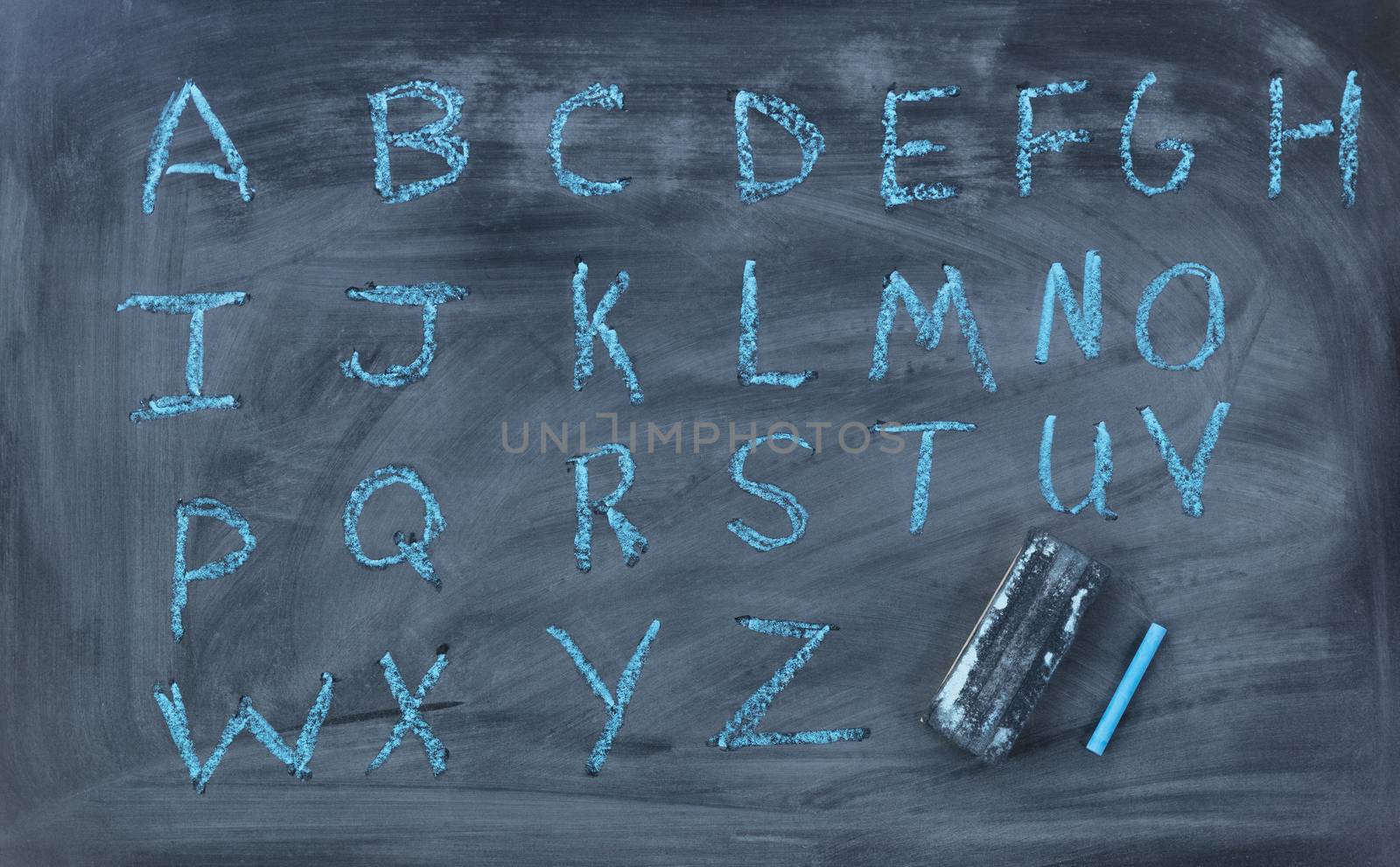 English alphabet letters written on chalk board with eraser by tab1962