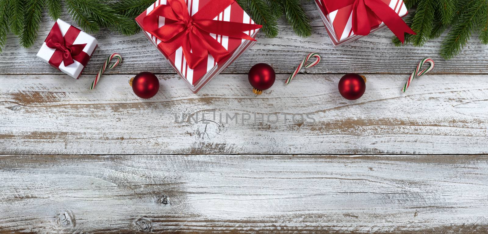 Merry Christmas holiday top border on white weathered wooden bac by tab1962