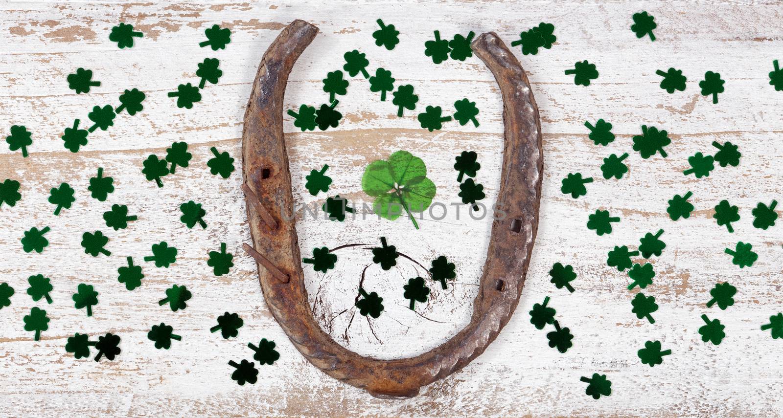 St Patrick Day lucky items on rustic white wood by tab1962