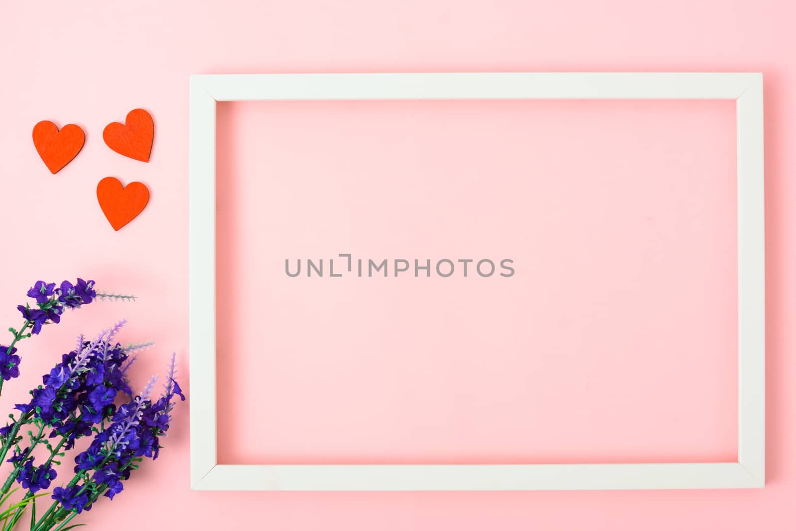 Valentine's Day Concept, Top view Flat lay, photo frame on Pink background with copy space for your text