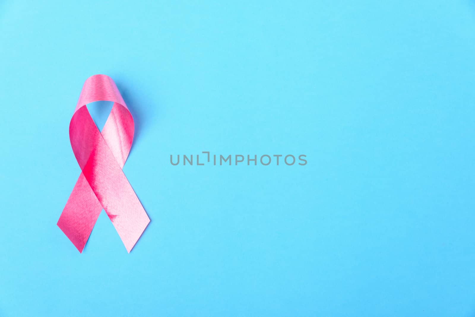 Breast cancer month concept, flat lay top view, pink ribbon  by Sorapop