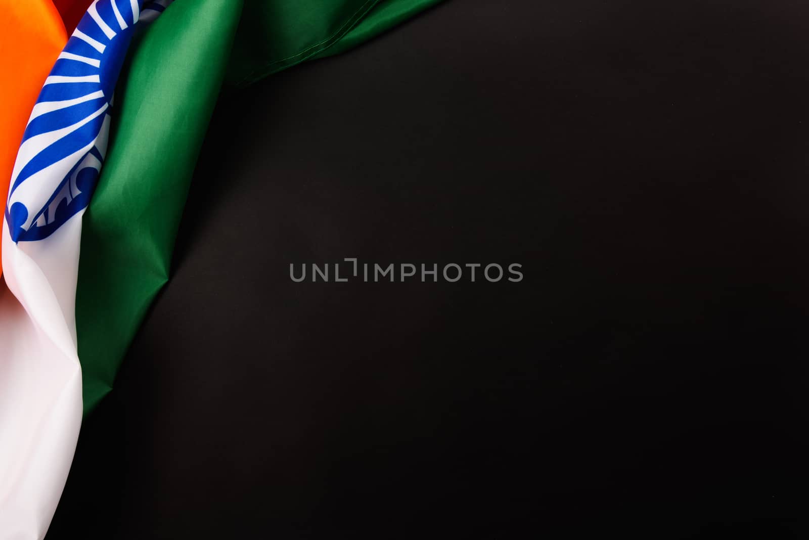 Indian republic day, flat lay top view, Indian flag on black background with copy space for your text