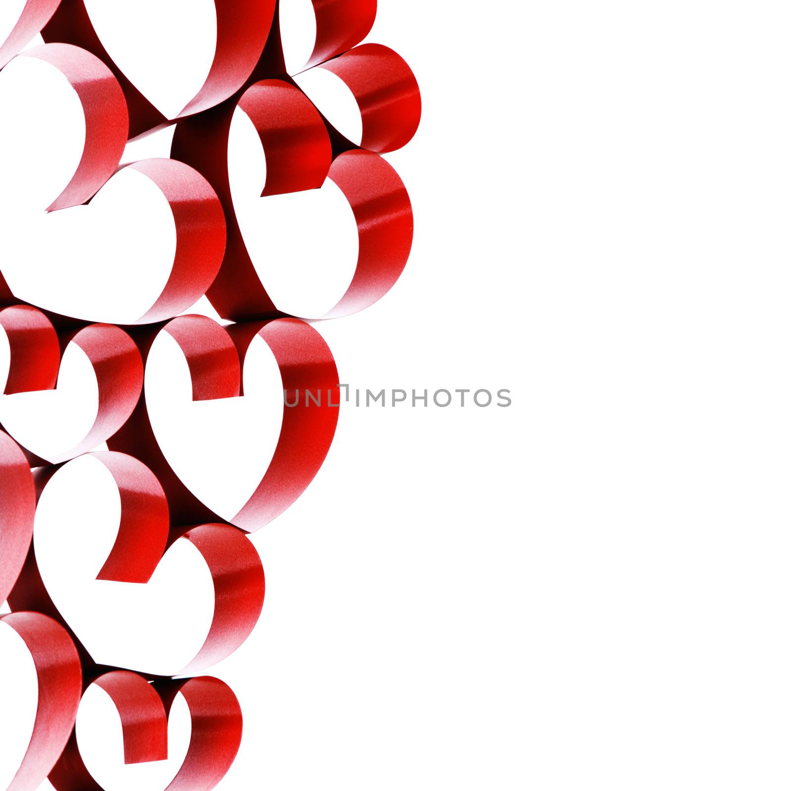 Linked red ribbon hearts isolated on white background