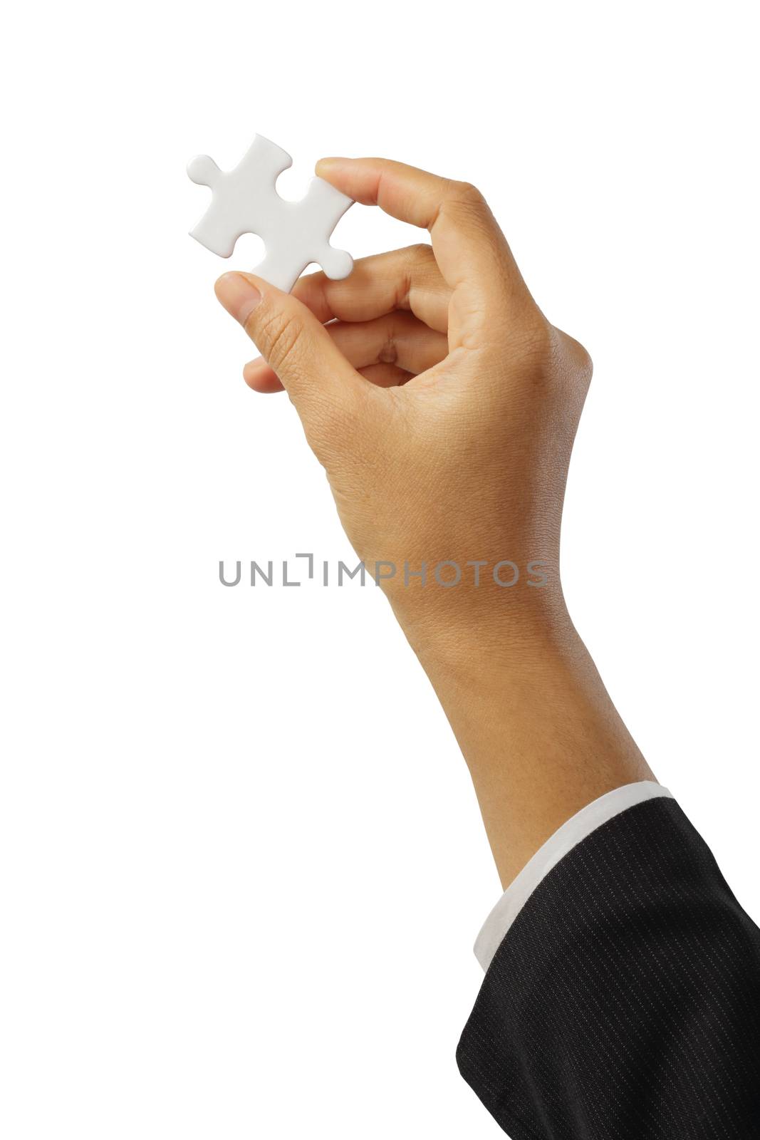 Businesswoman holding white puzzle isolated on white background, clipping path.