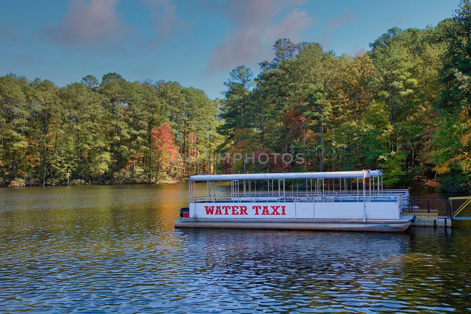 Water Taxi in Calm Lake by dbvirago