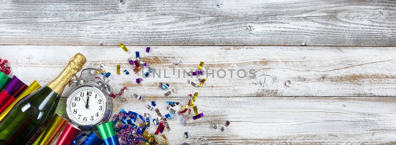 Happy New Year at midnight concept on white weathered wood  by tab1962