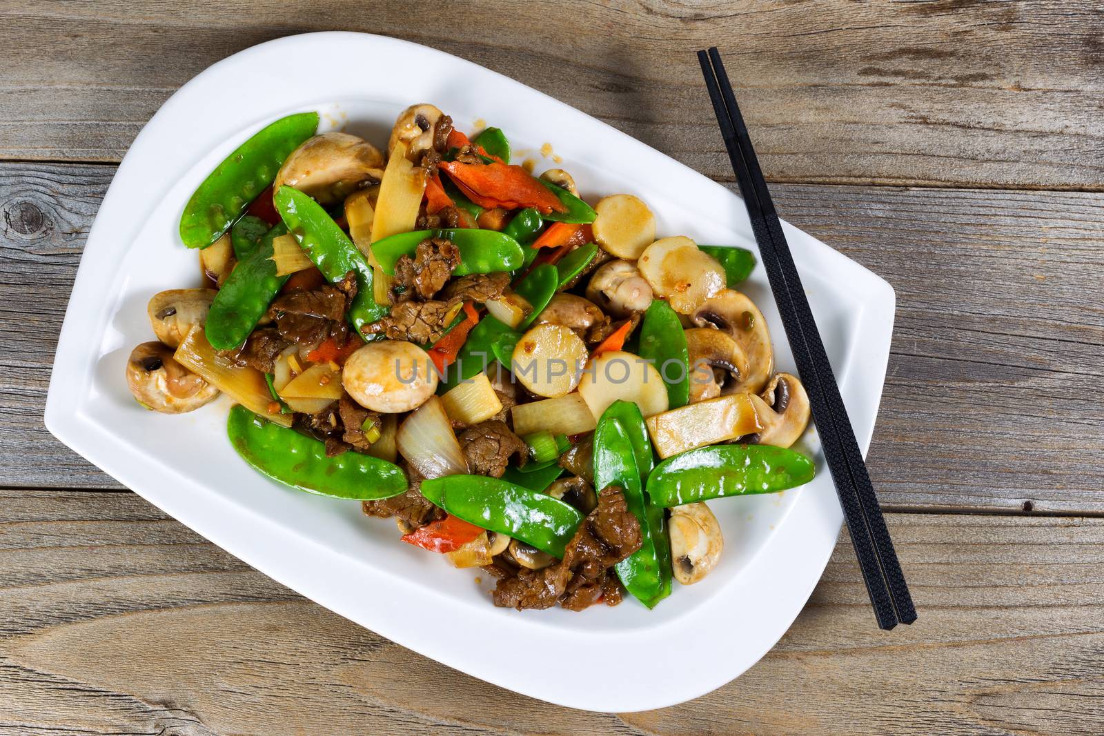 Chinese sliced beef and veggies dish ready to eat by tab1962