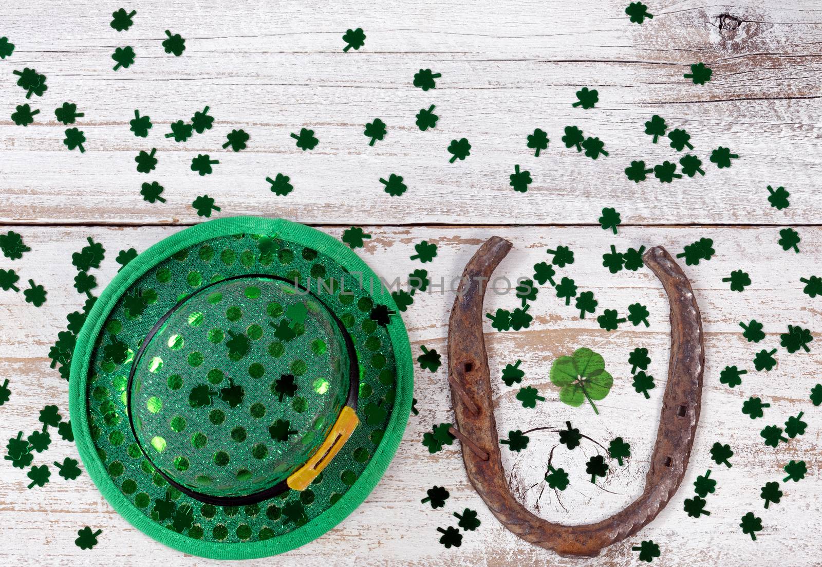 Lucky St Patrick Day with traditional items on rustic white wood by tab1962
