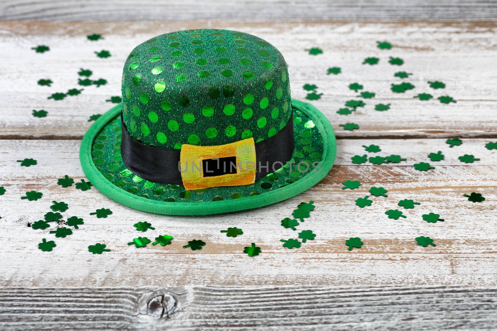 St Patrick hat and clovers in close up view  by tab1962