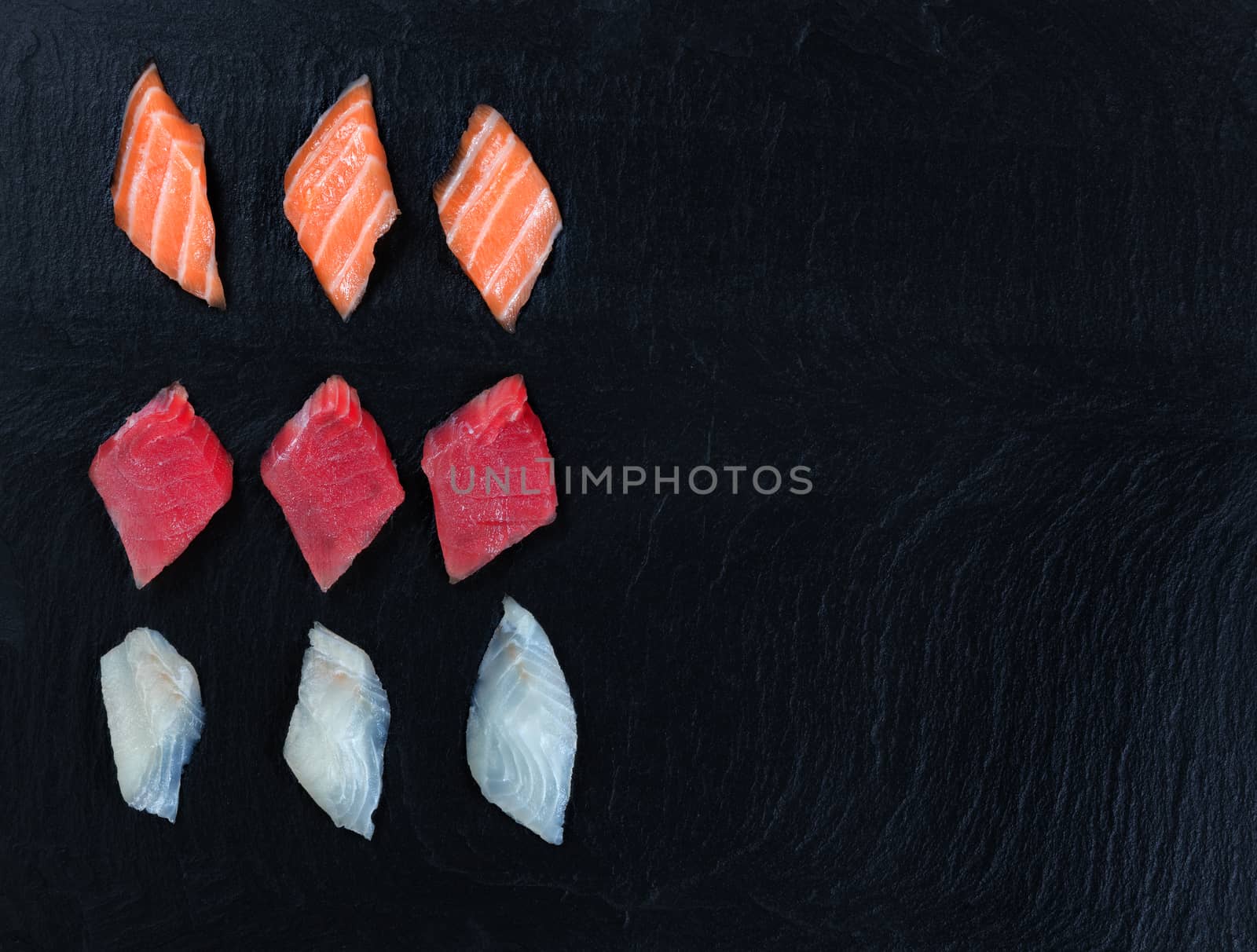 Variety of Sushi on natural slate stone background by tab1962