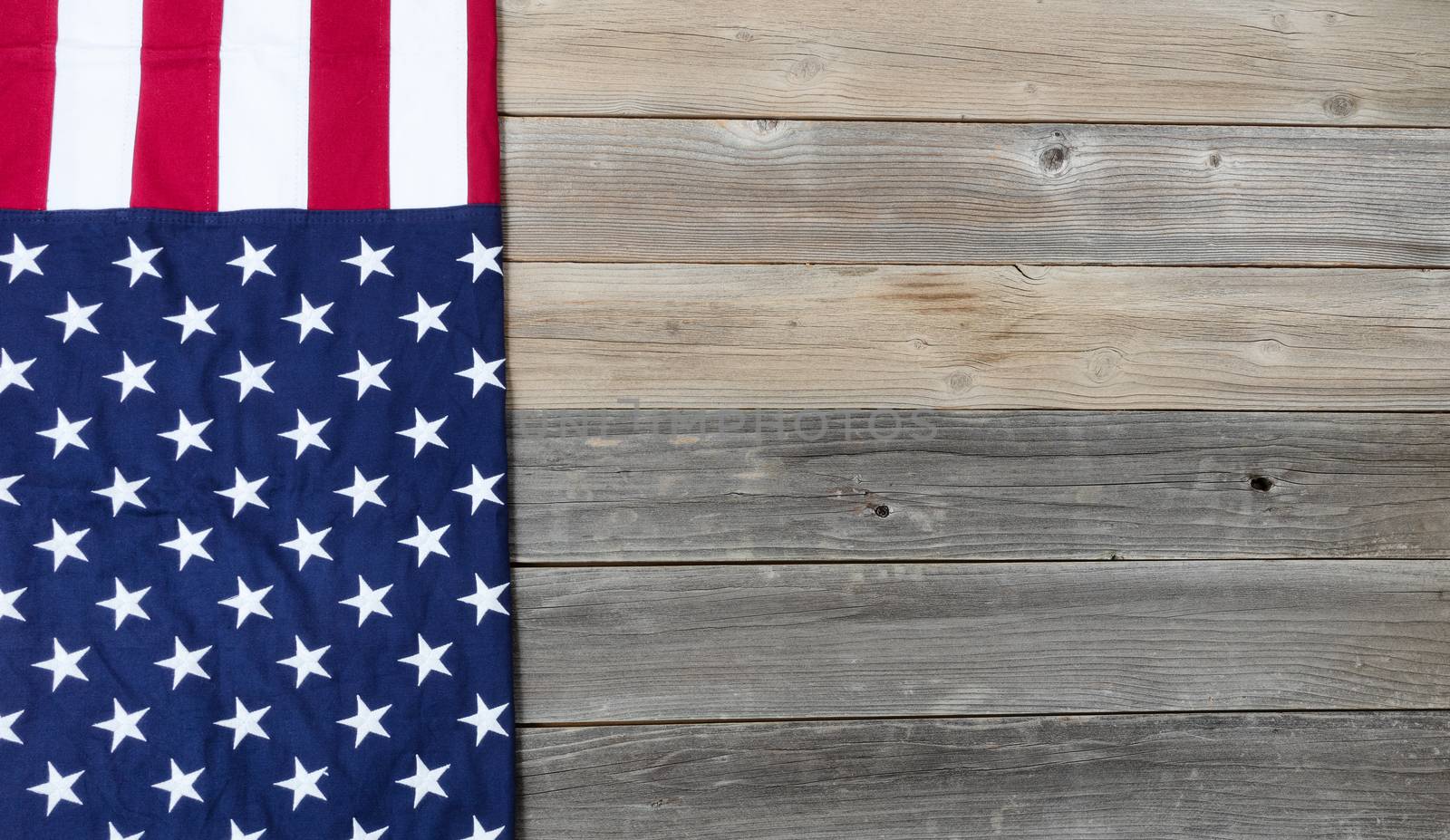 United States Flag on rustic wooden planks for holiday background