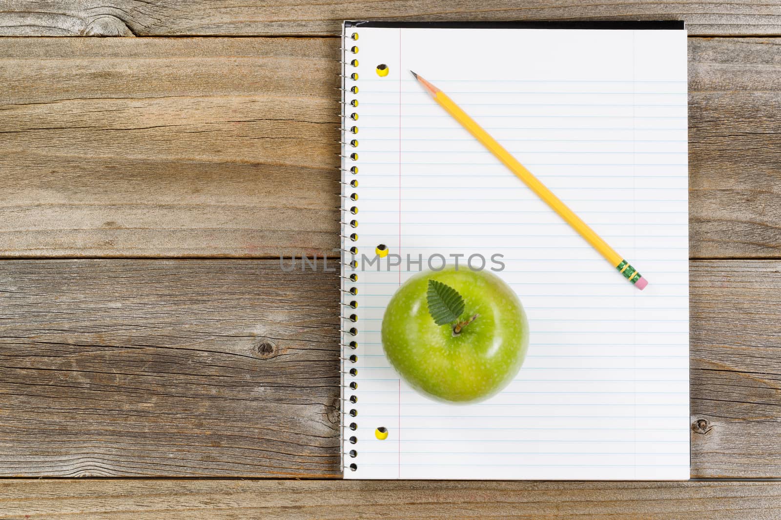 Basic tools for school or office on rustic wooden boards by tab1962