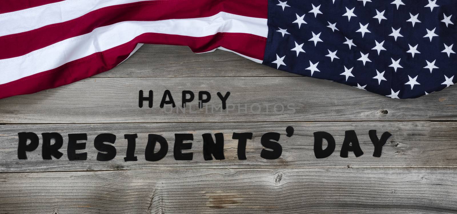 Happy Presidents day in large text letters on rustic wood with U by tab1962