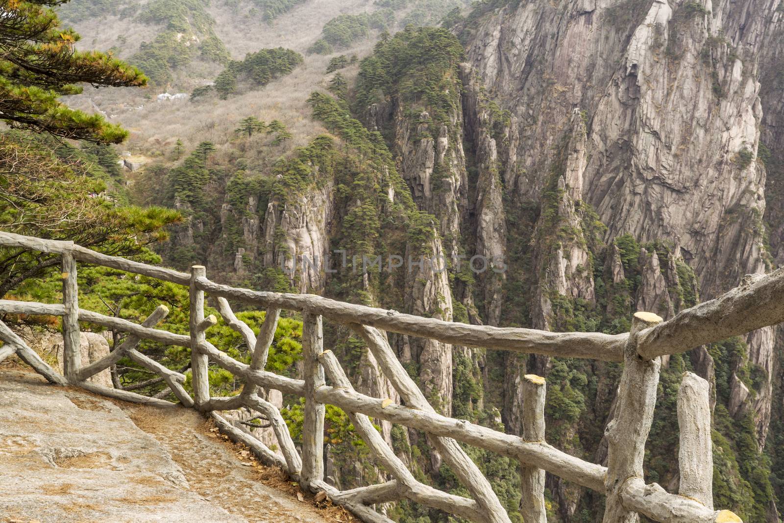 Stone and wooden fence in China's yellow mountains 