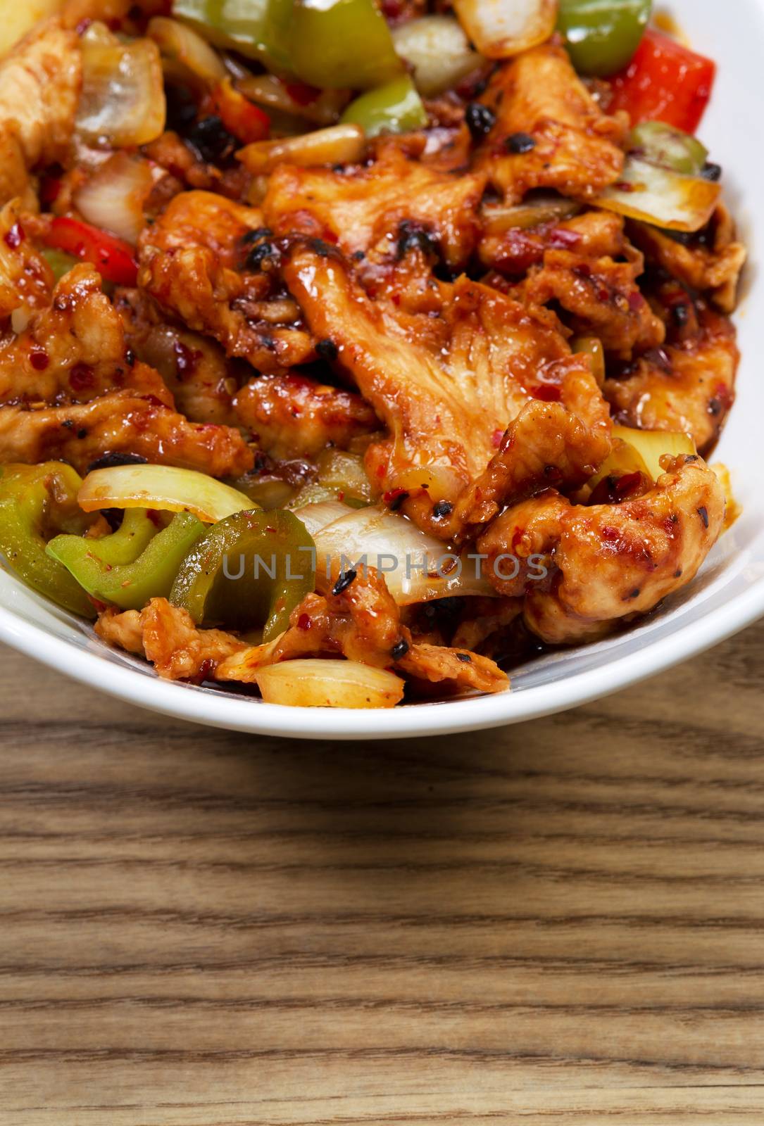 Chinese Spicy Chicken Dish in white bowl  by tab1962