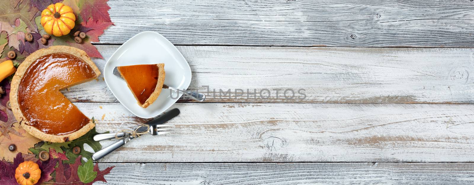 Homemade pumpkin pie served for the Autumn holidays by tab1962