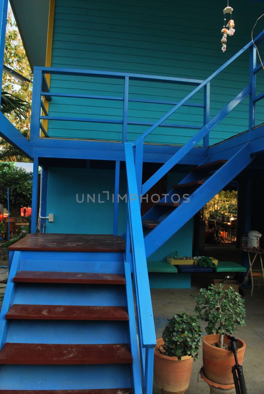 Steel staircase to the house. by thitimontoyai