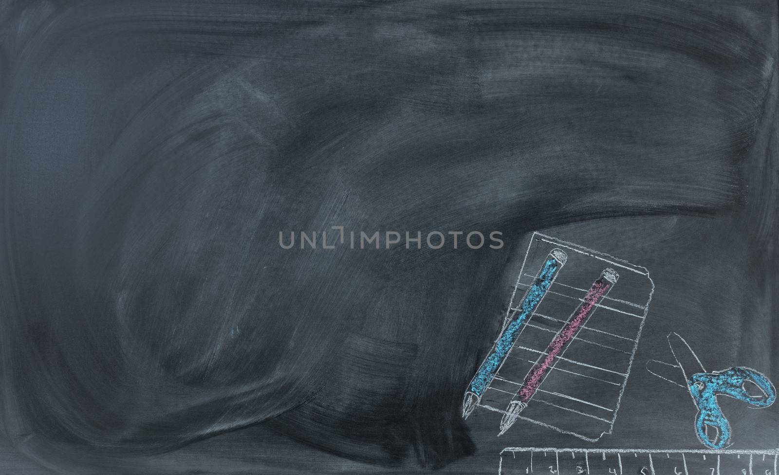 Back to school hand drawn materials on erased chalkboard    by tab1962