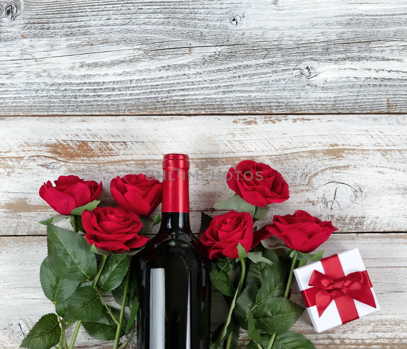 Valentines Day celebration with red wine and gifts in bottom of  by tab1962