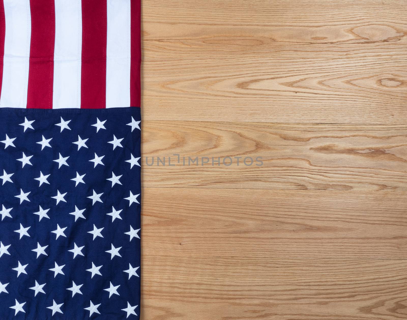 US Flag on wooden red oak planks for holiday background by tab1962