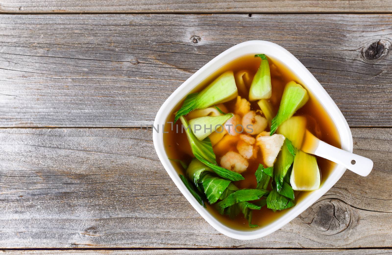 Chinese soup dish in bowl setting ready to eat  by tab1962