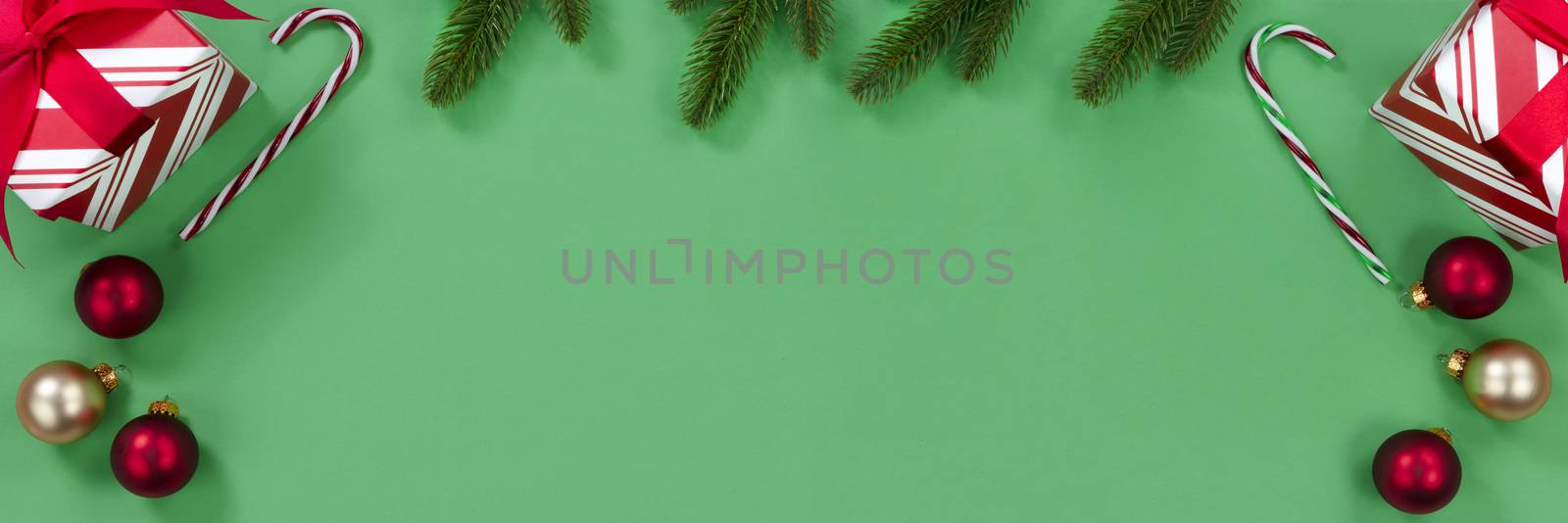 Bright green background with decorations for the Christmas seaso by tab1962