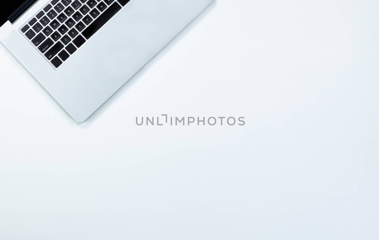 Clean white desktop with mobile computer  by tab1962