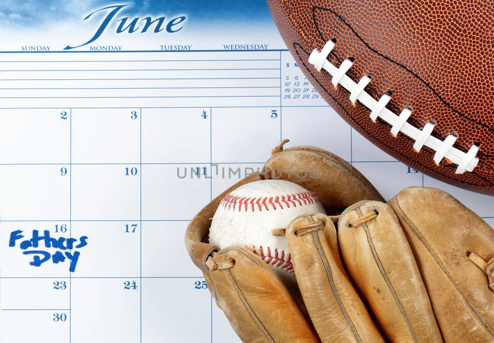 Fathers Day holiday marked on calendar with sports equipment    by tab1962