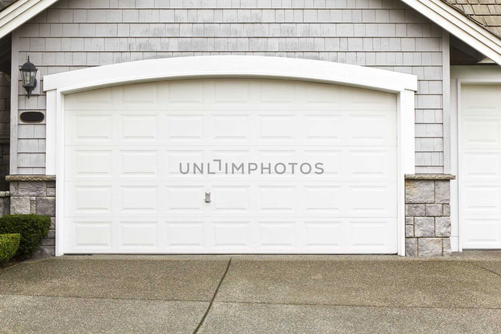 New white paint job on garage frame door- enamel 