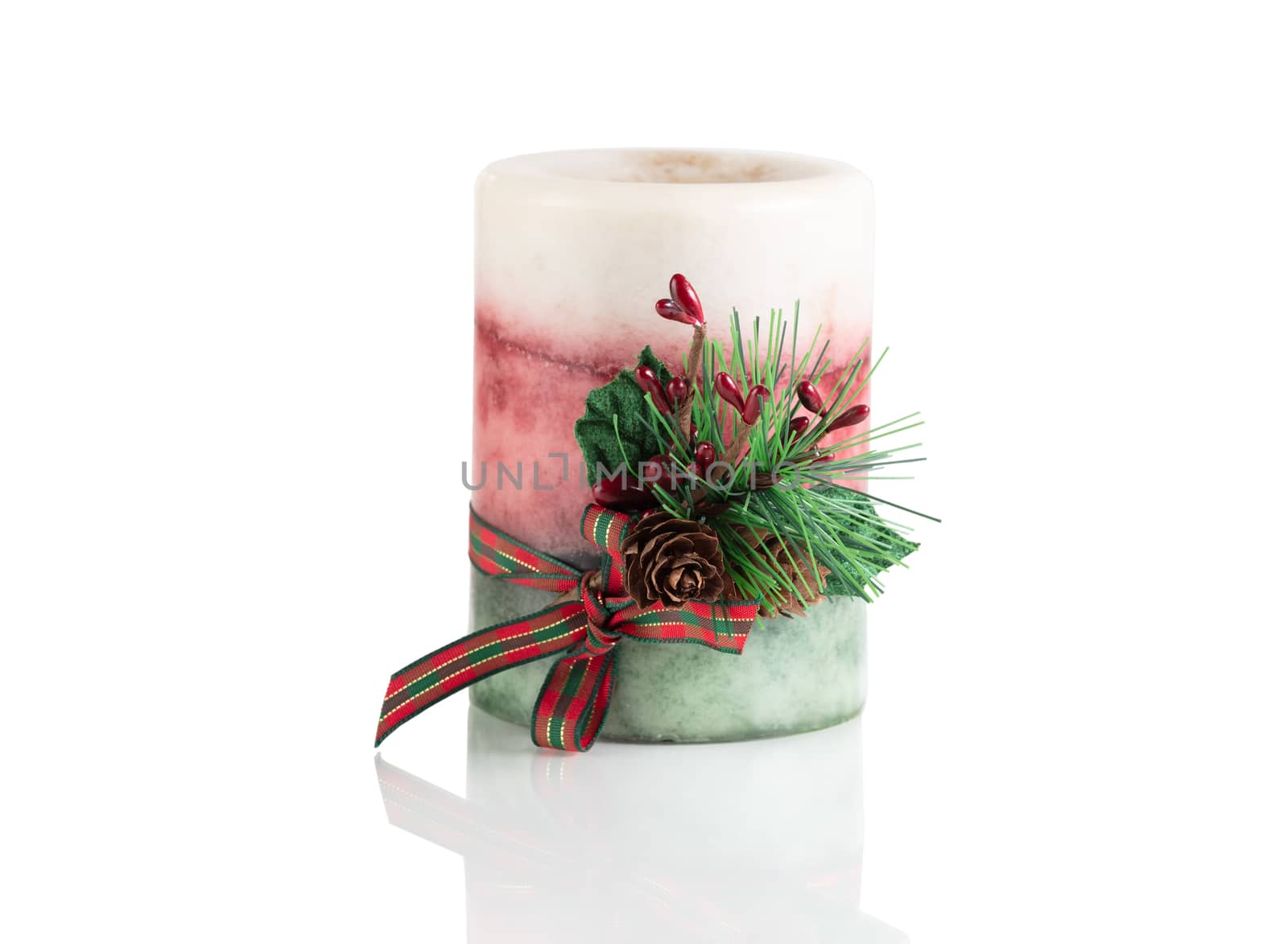 Seasonal Christmas candle isolated on a white background  by tab1962