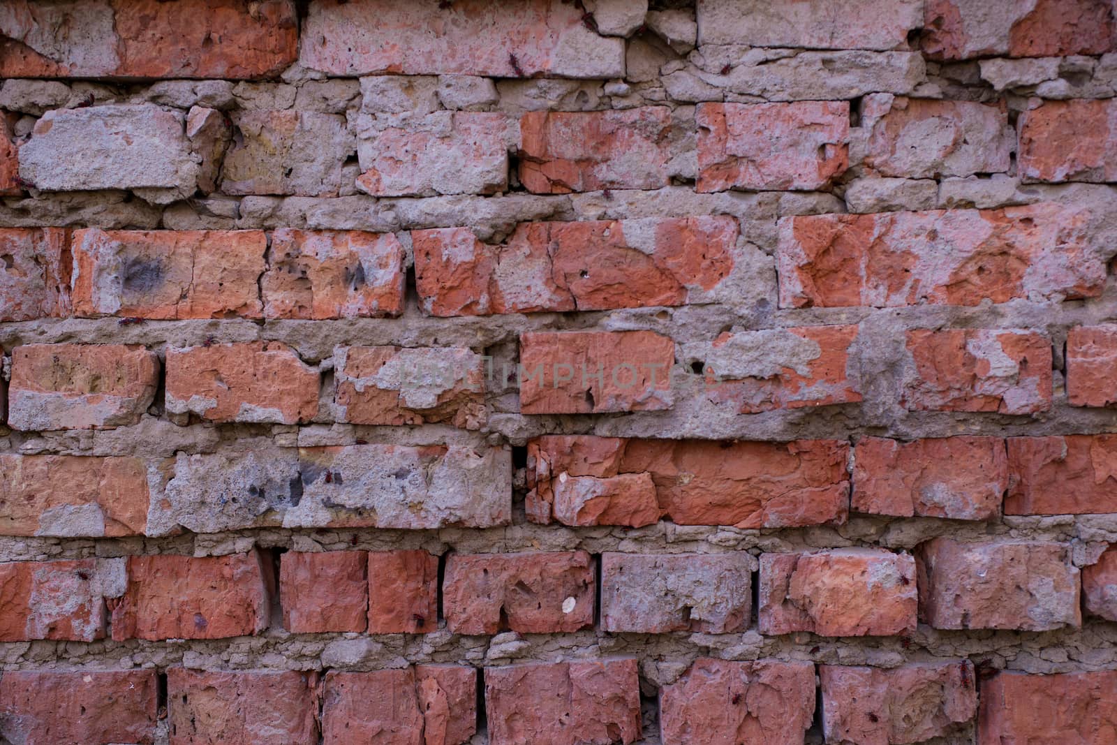 Old orange brick wall pattern. Brick background. Good wallpaper. Stock photo of old wall.