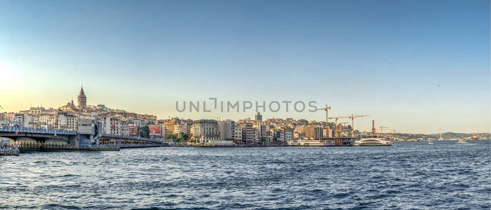 Istambul, Turkey – 07.12.2019. Panoramic view of Galata Bridge and Galata Tower in istanbul on a sunny summer evening