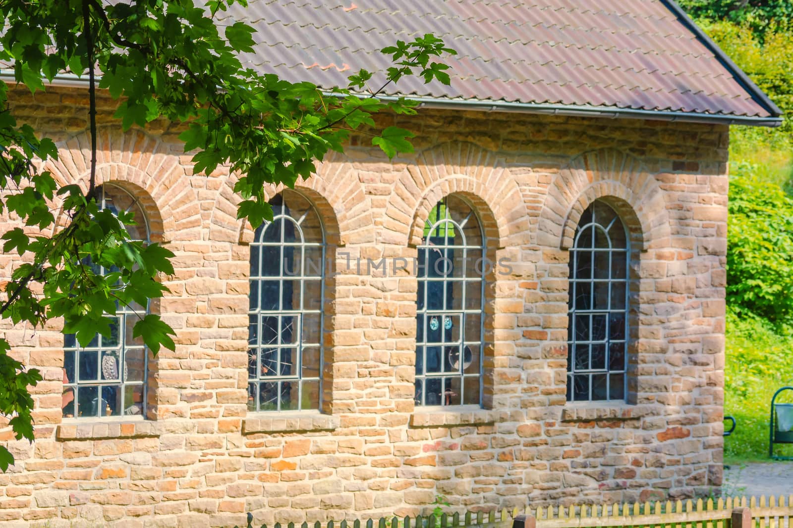 Natural stone cottage built with antique bricks