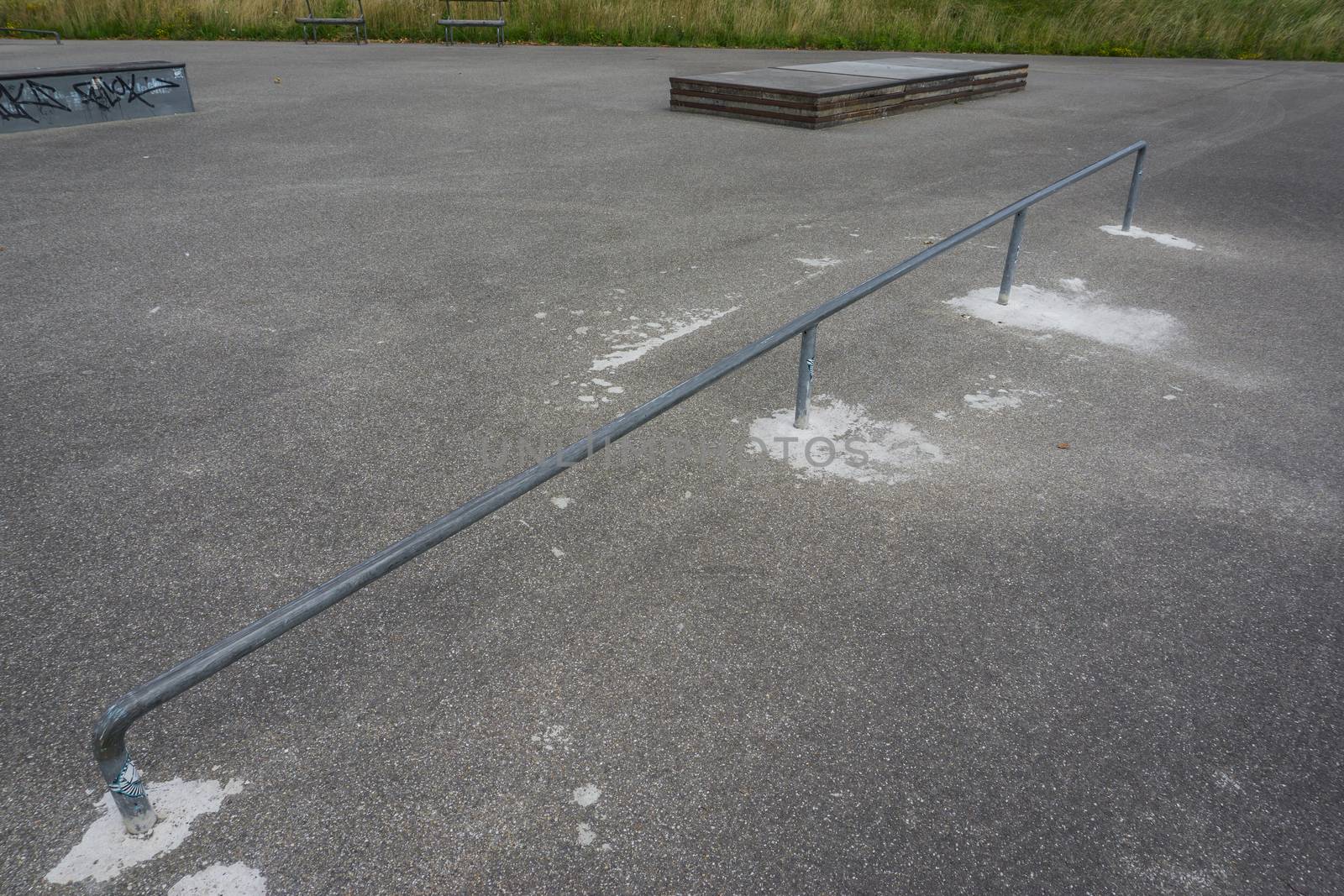 skateboard grind railing at the skate park upper view
