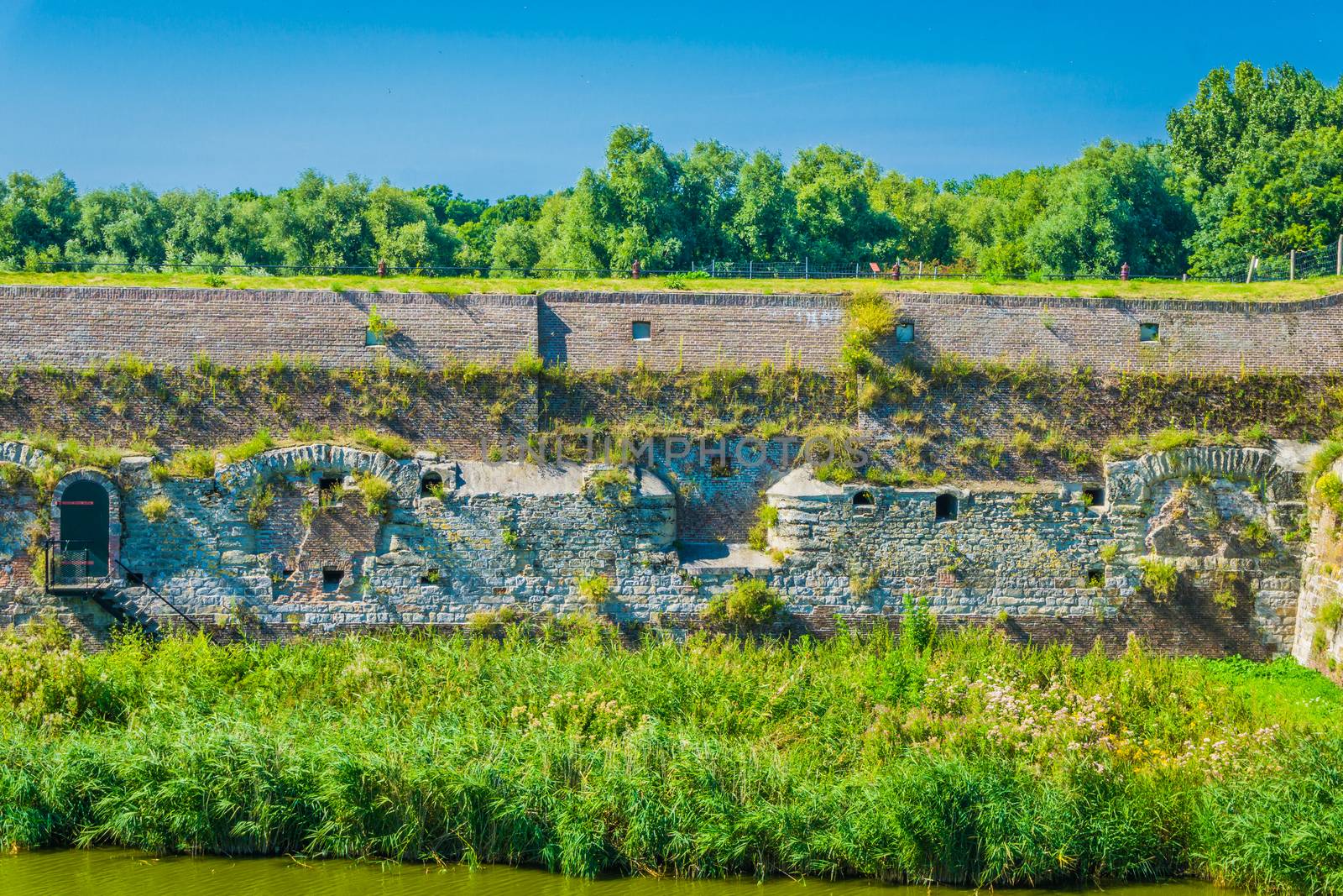 beautiful water landscape with old style wall by charlottebleijenberg