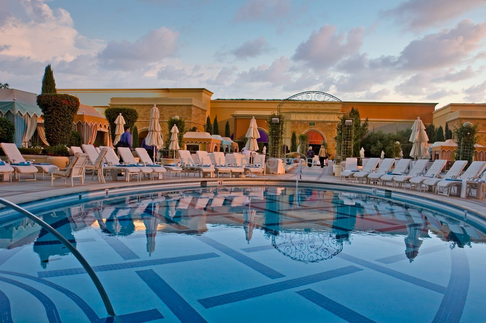 A quiet pool at a high rise luxury hotel