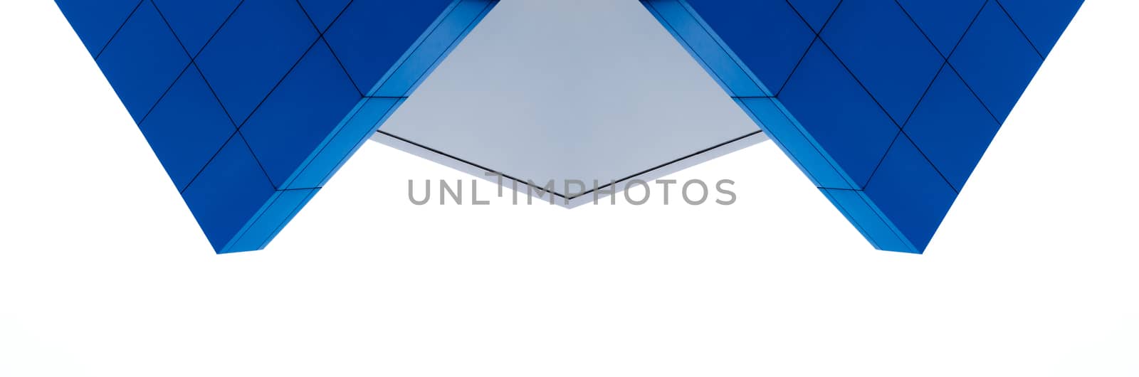 architectural abstract pattern fragment of a wall of blue modern building on a white background