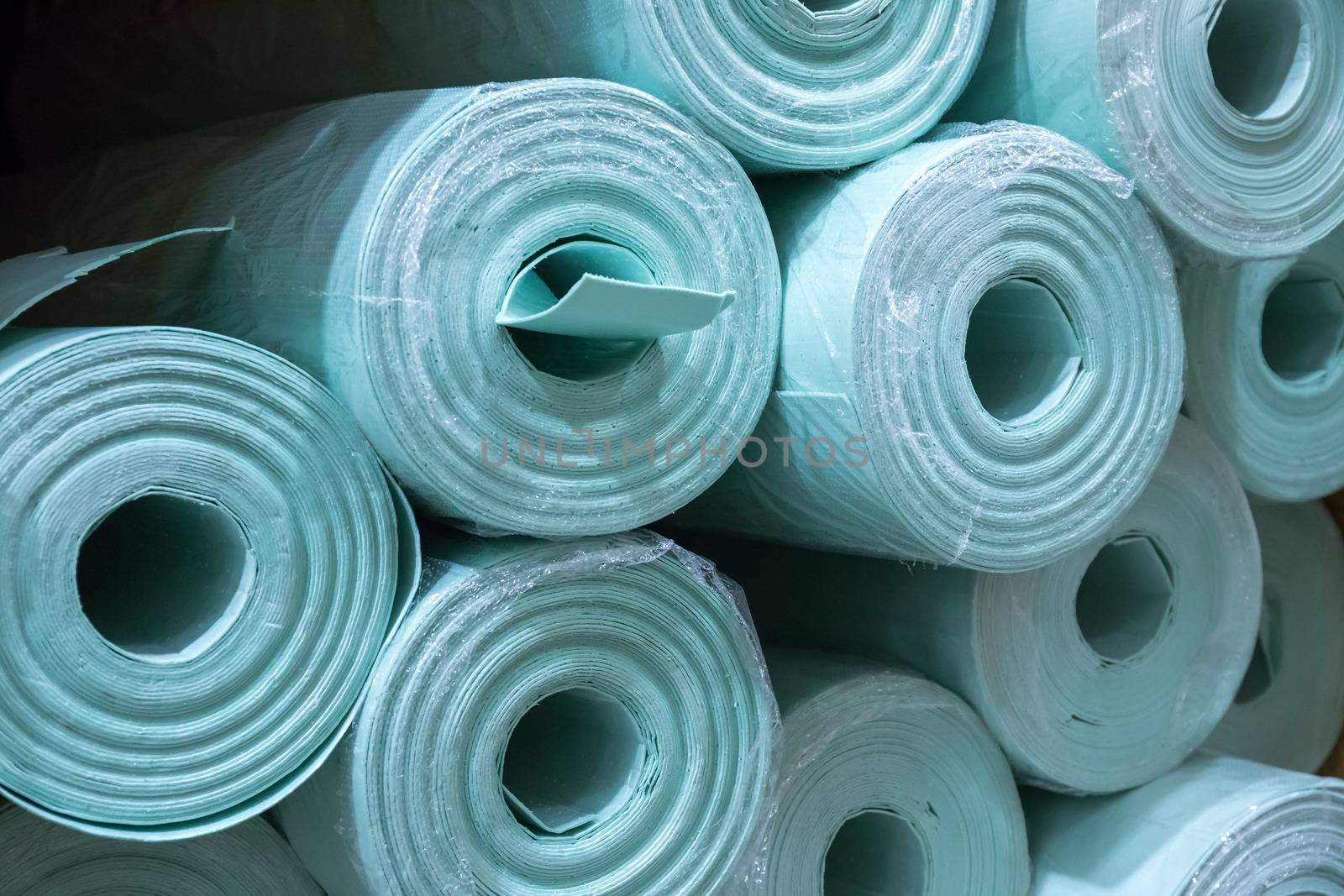 Pile of insulation material rolls.