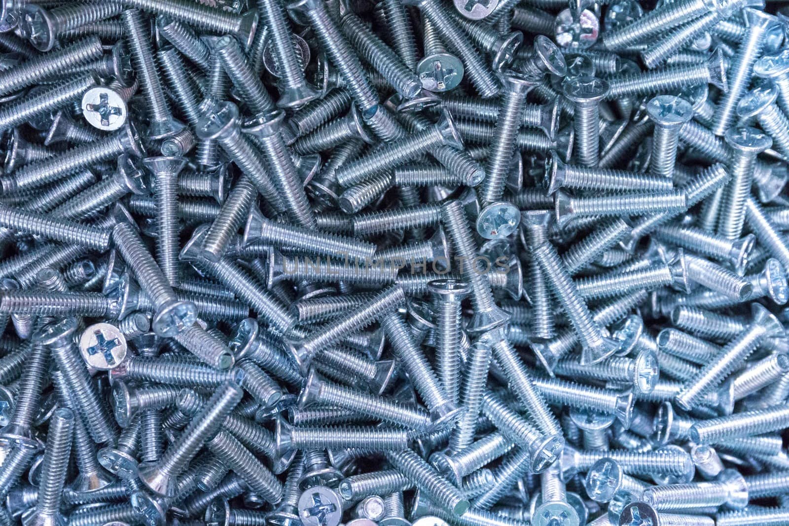 Metal Bolts top view close-up. background texture, filled frame. by petrsvoboda91