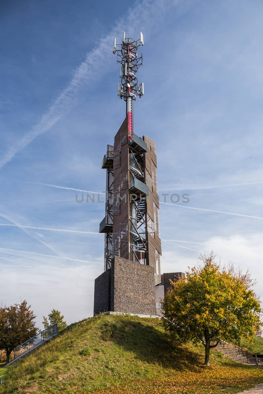 Romanka Lookout Tower is located near village Hruby Jesenik in the district Nymburk in the Central Region. Czech republic. Is is also antenna transmitter. Nice autumn colorful scene with blue sky. by petrsvoboda91
