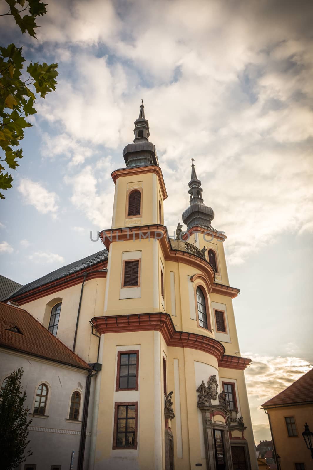 Litomysl, Czech Republic, Church of the Discovery of the Holy Cross and the Piarist Order College. Church is in baroque style.