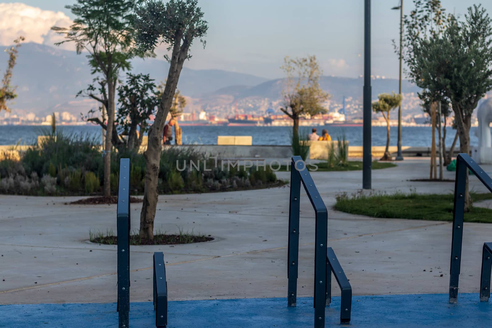 a wide landscape shoot from mavisehir coast - there is some people. photo has taken at izmir/turkey.