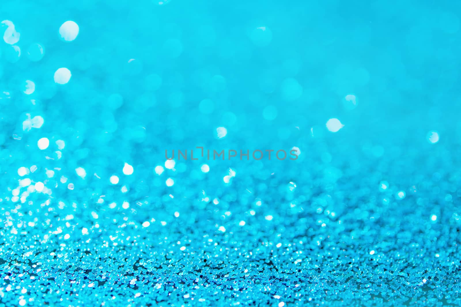 Defocused blue glitter background. blue abstract bokeh background. Christmas abstract background
