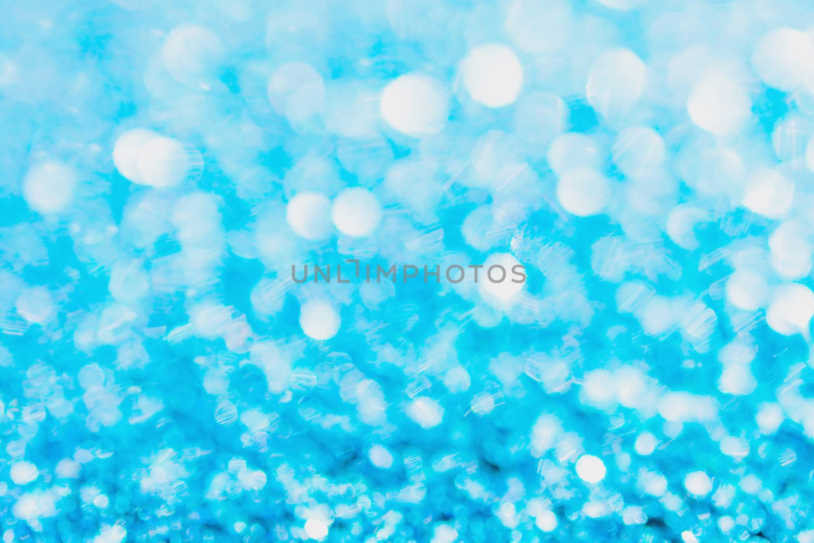 Defocused blue glitter background. blue abstract bokeh background. Christmas abstract background
