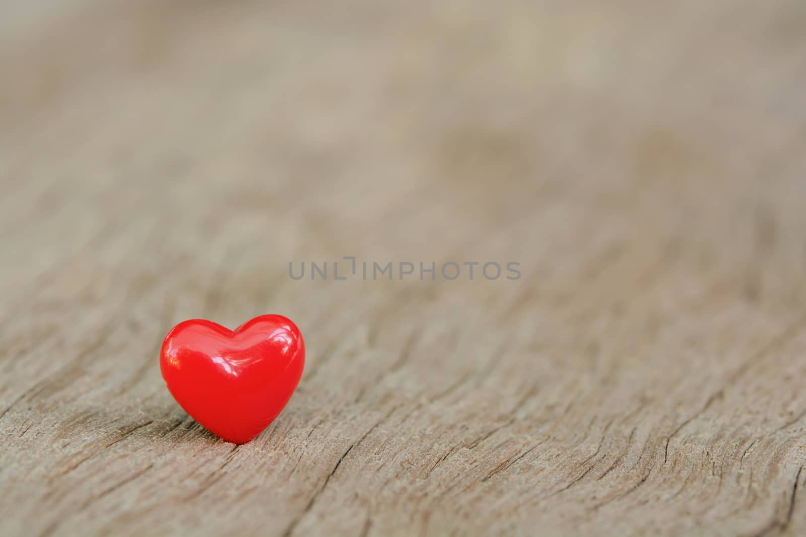 Valentines Day background with red hearts on plank wooden, copy space
