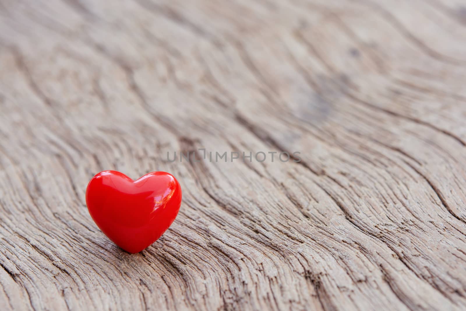 Valentines Day background with red hearts on plank wooden, copy space
