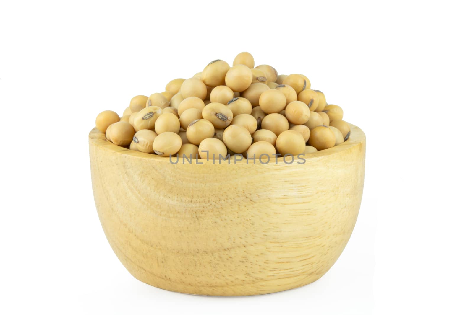 Soy beans in bowl wood isolated on white background with clipping path
